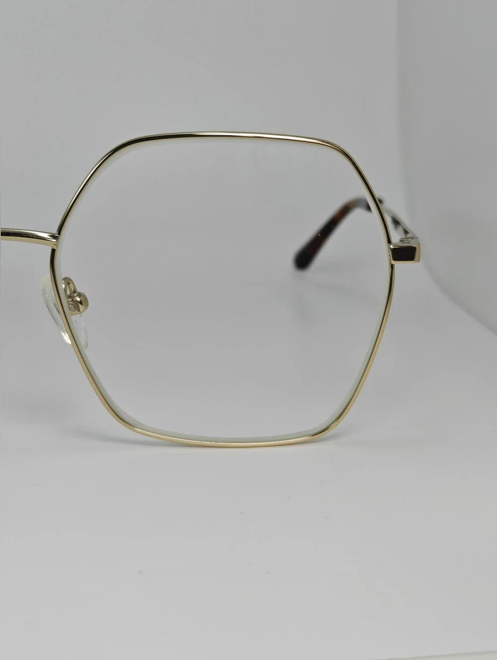 Elixir. Titanium.Gold Polygon. Metal Frame Women's Eyewear.